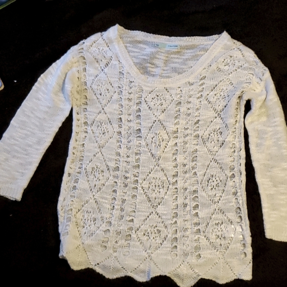 Medium off-white sweater. Light weight
